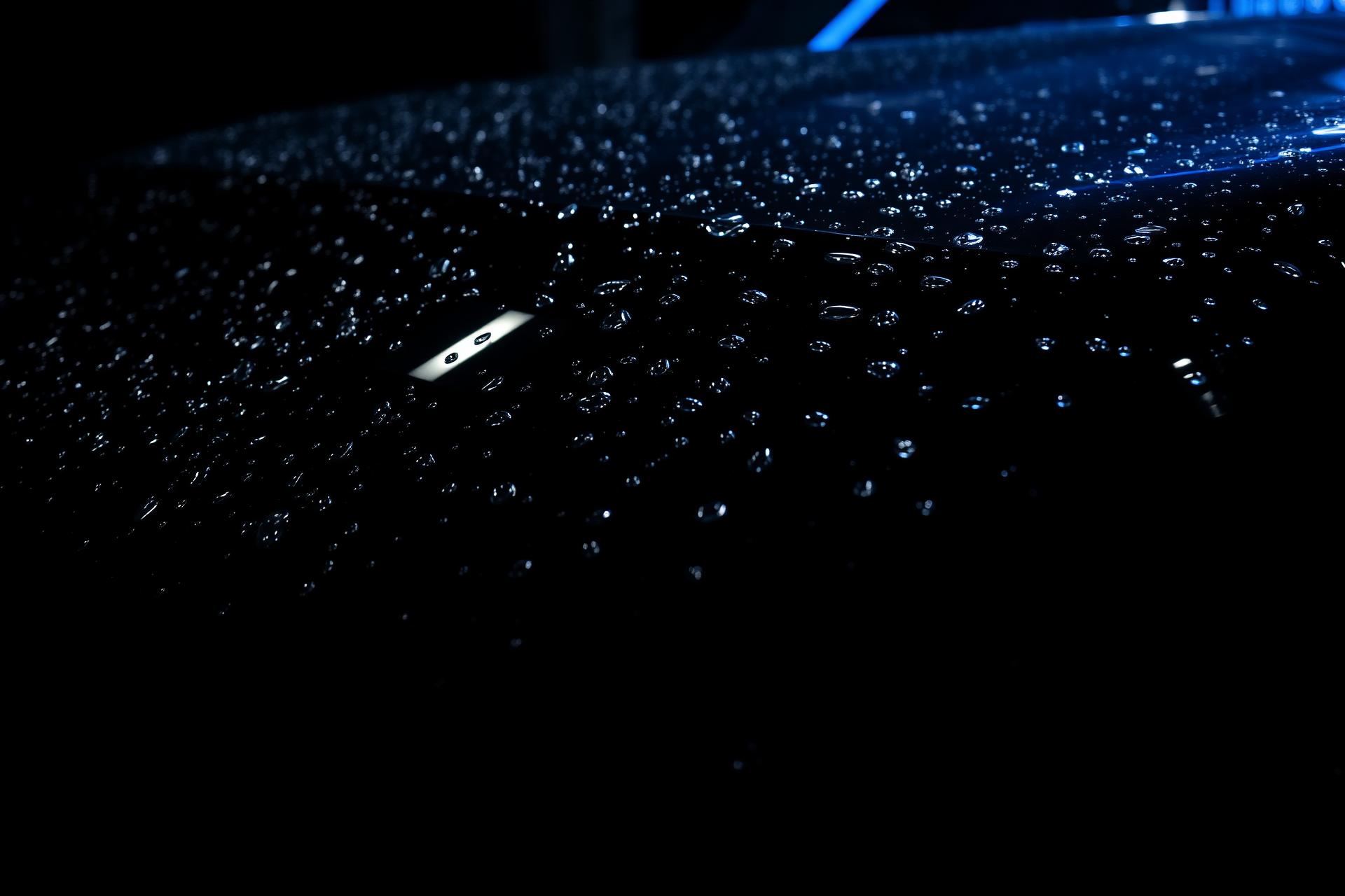 Glossy black car after NitroShyn detail